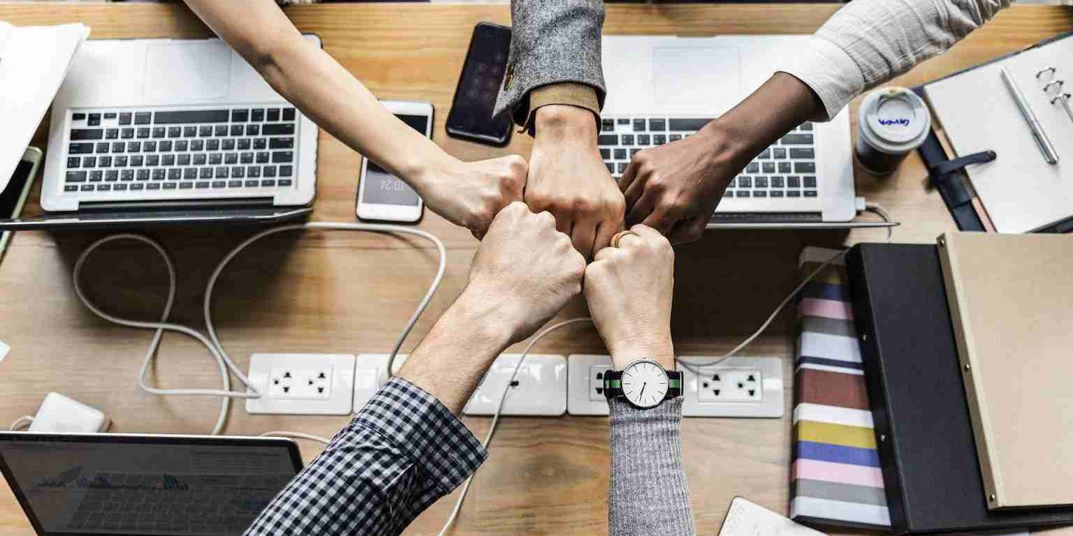 consultants working together in a positive environment